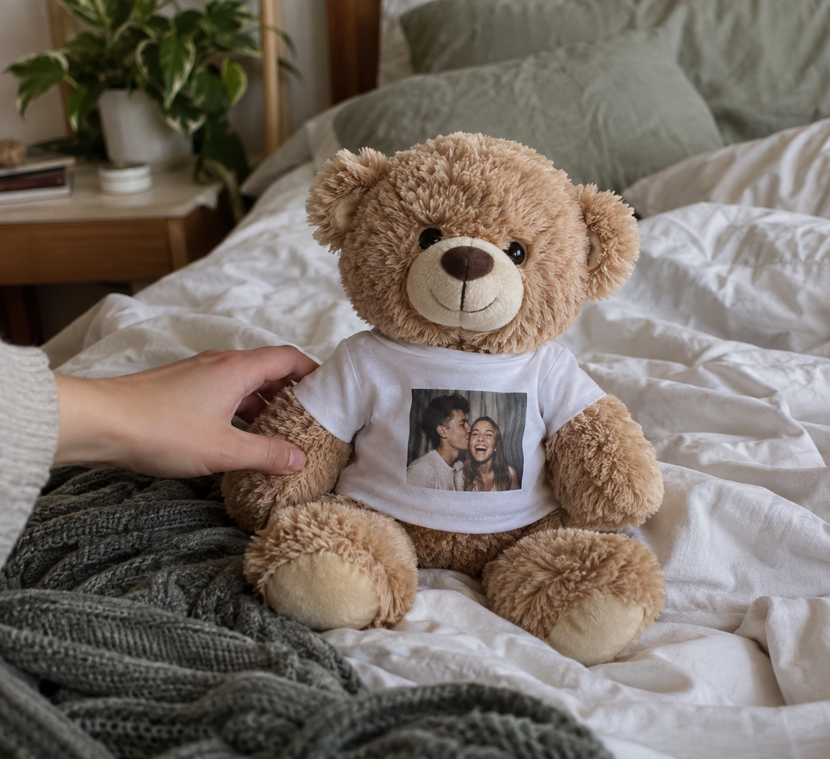 Teddy bear wearing a mini tee with a couple photo