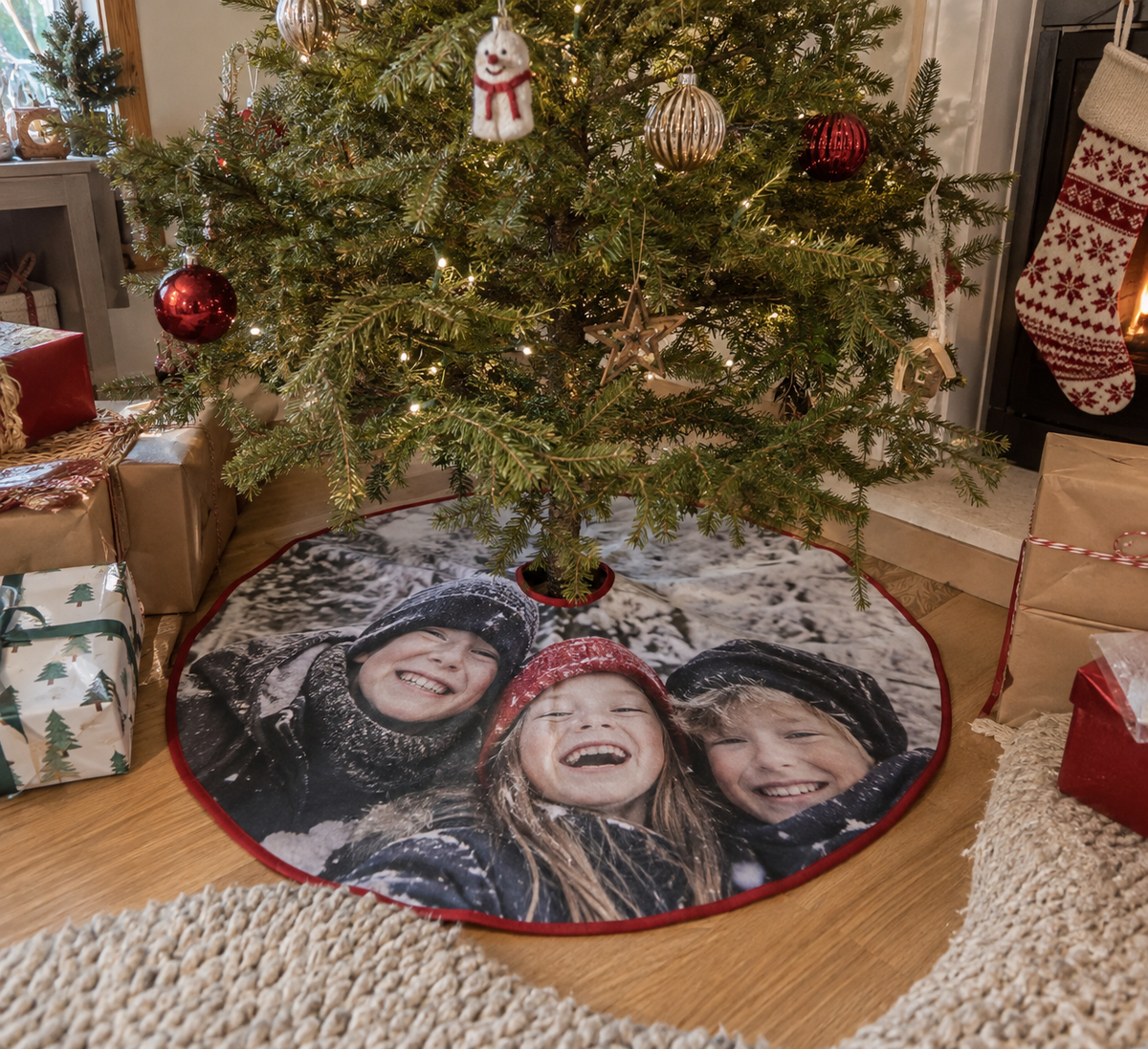 Tree skirt printed with a winter photo of siblings
