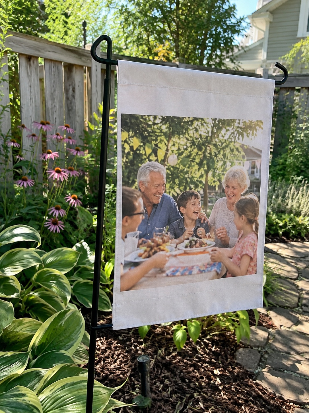 Garden banner printed with a family lunch photograph
