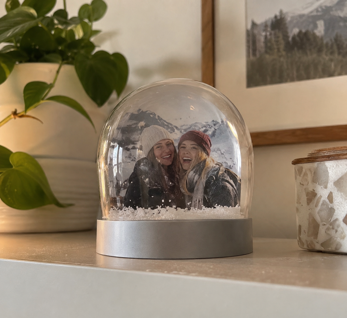 Snow globe containing a personal winter photograph