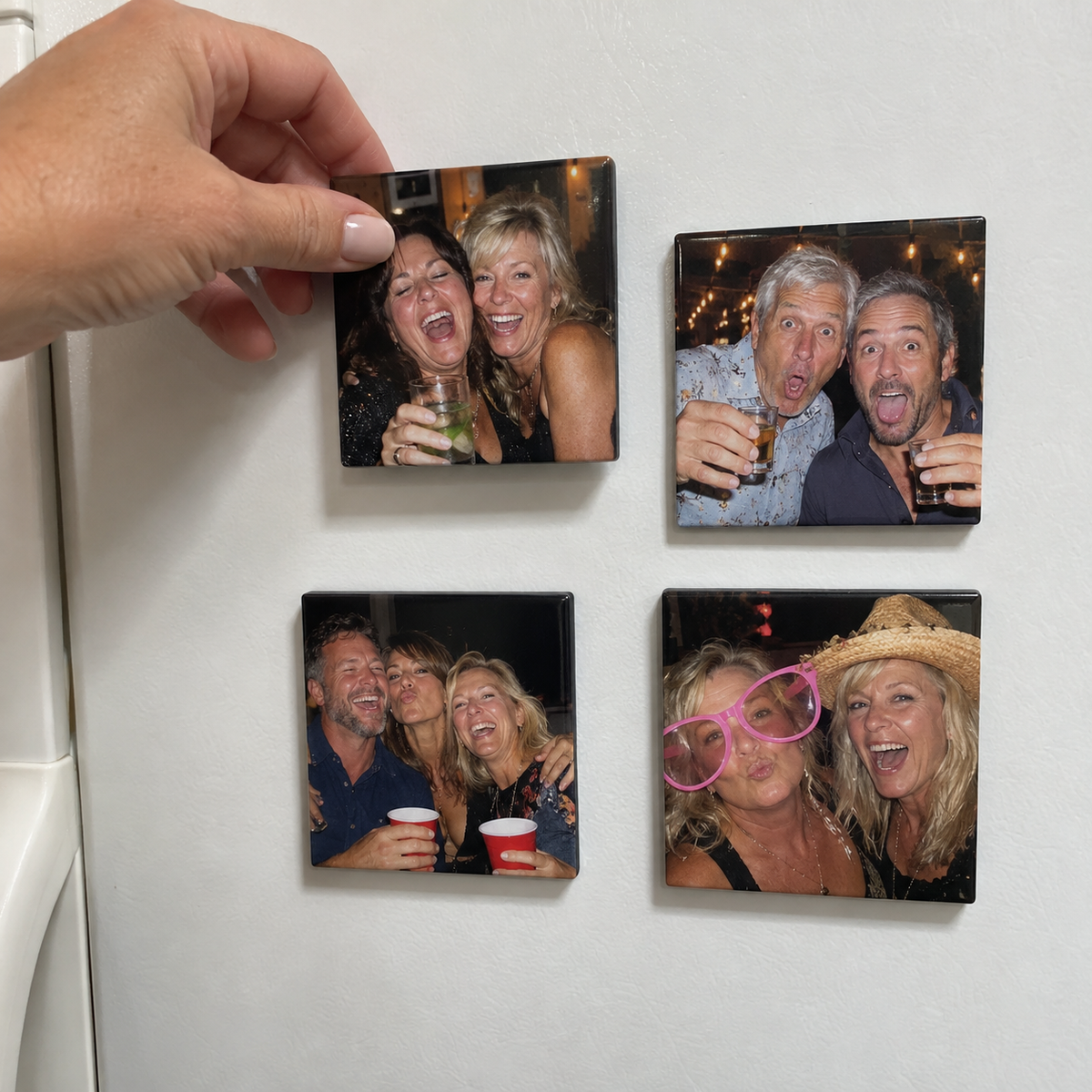 A set of custom photo magnets with family memories on a refrigerator.