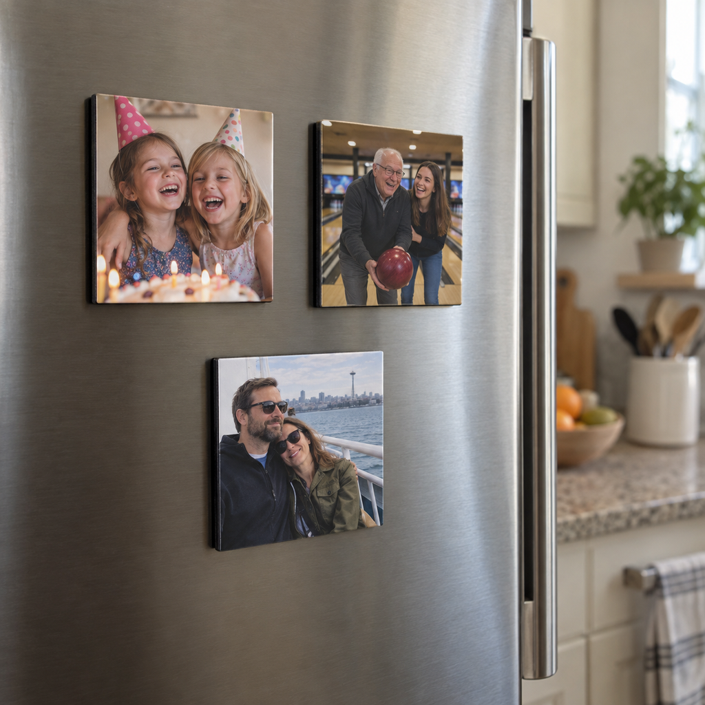 Three custom square photo magnets showing family memories on a refrigerator.