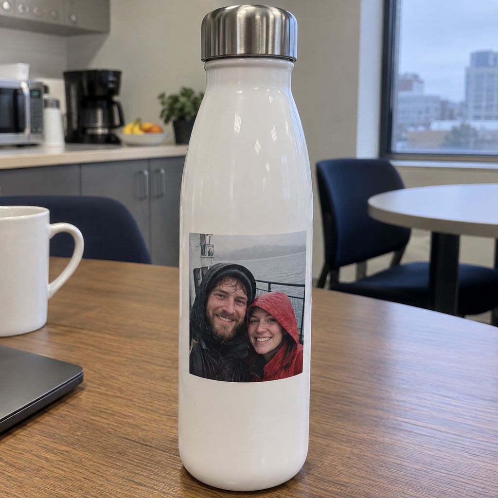 Slim bottle printed with a couple portrait in an office kitchen.