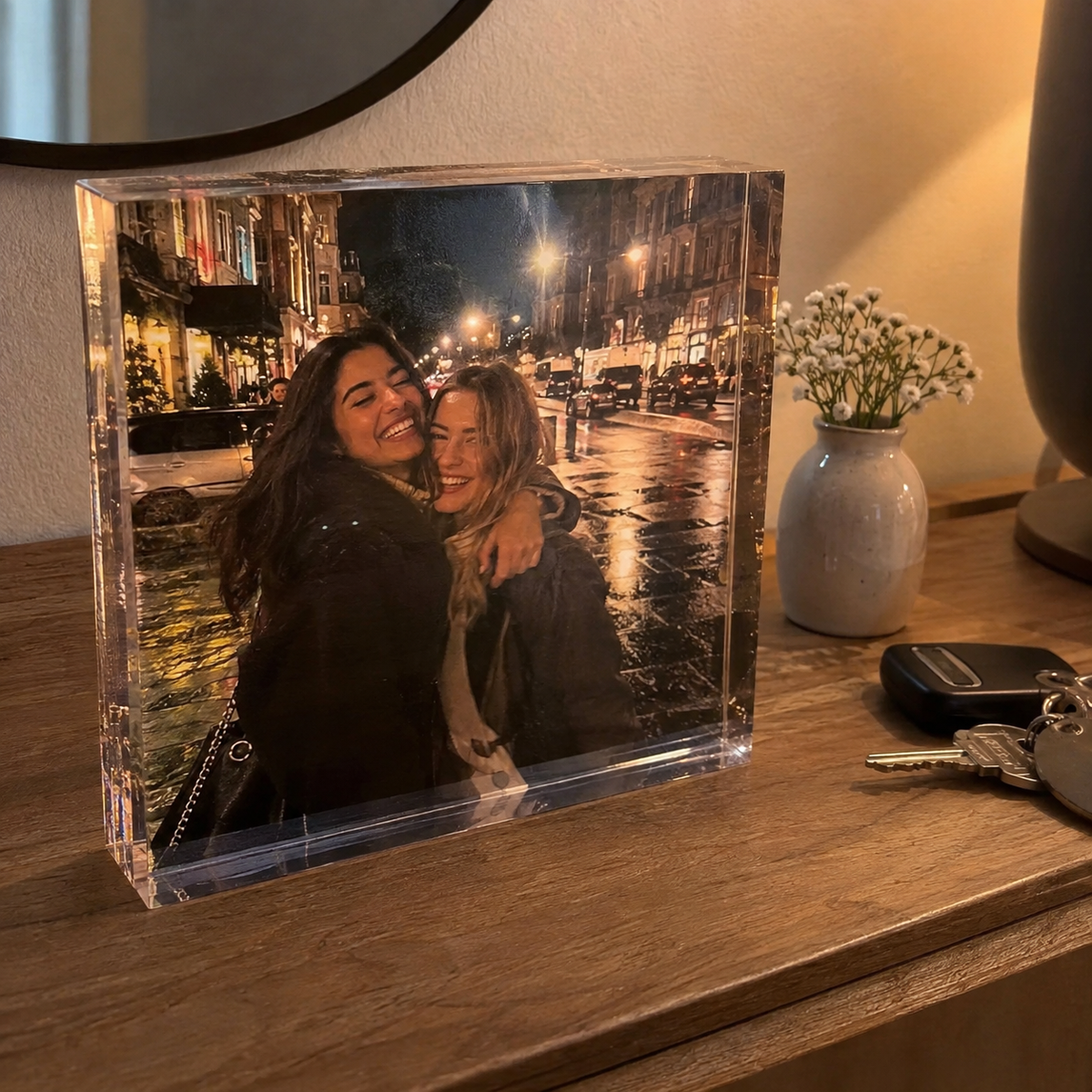 Acrylic photo print with two friends laughing on a rainy street.