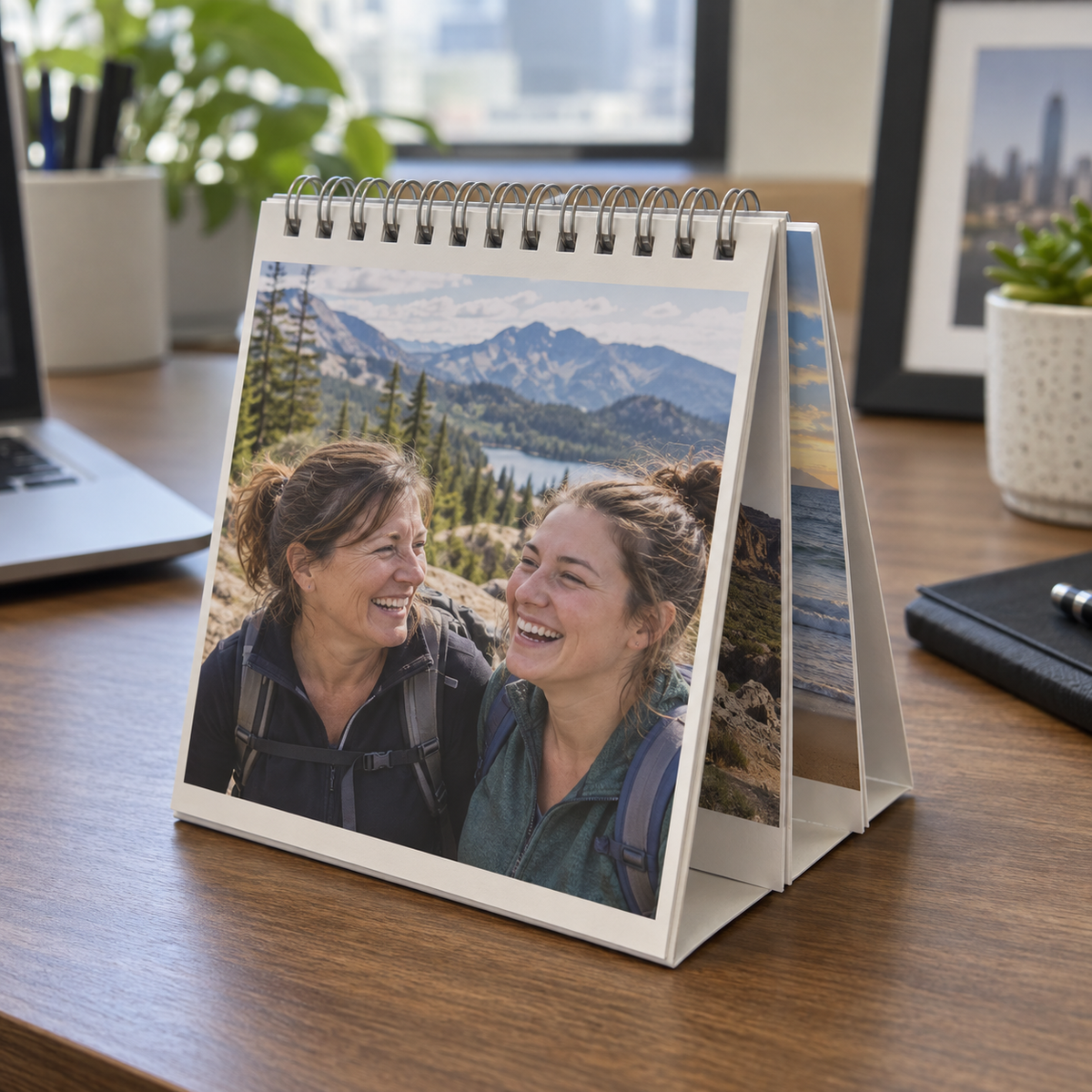 A desk photo calendar with a mother and daughter hiking memory on its cover.