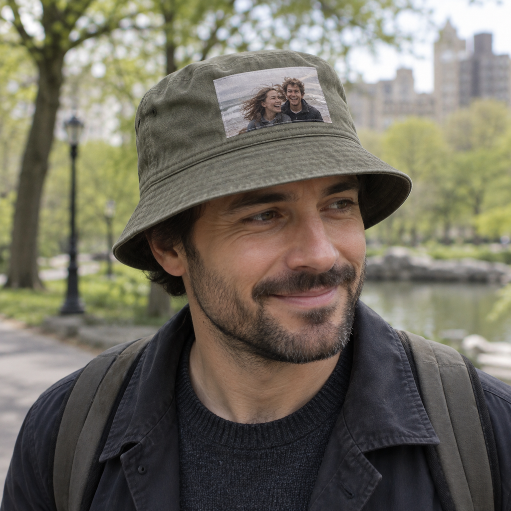 Bucket hat printed with a small beach photo in an urban park.
