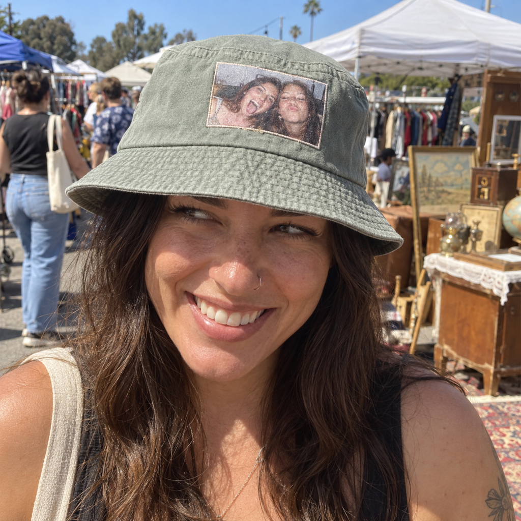 A bucket hat printed with a small funny friends photo at a flea market.