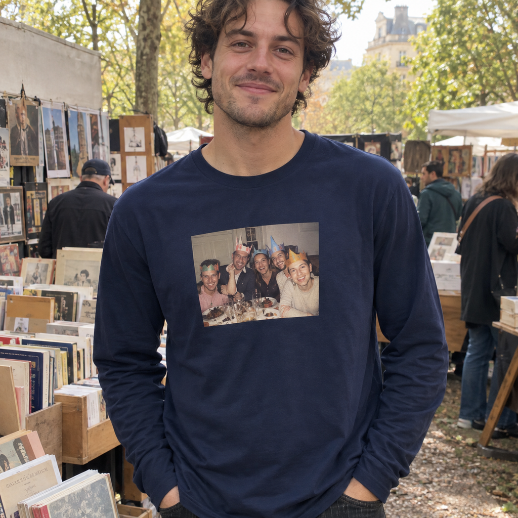 Navy long-sleeve shirt printed with friends at a playful home dinner.