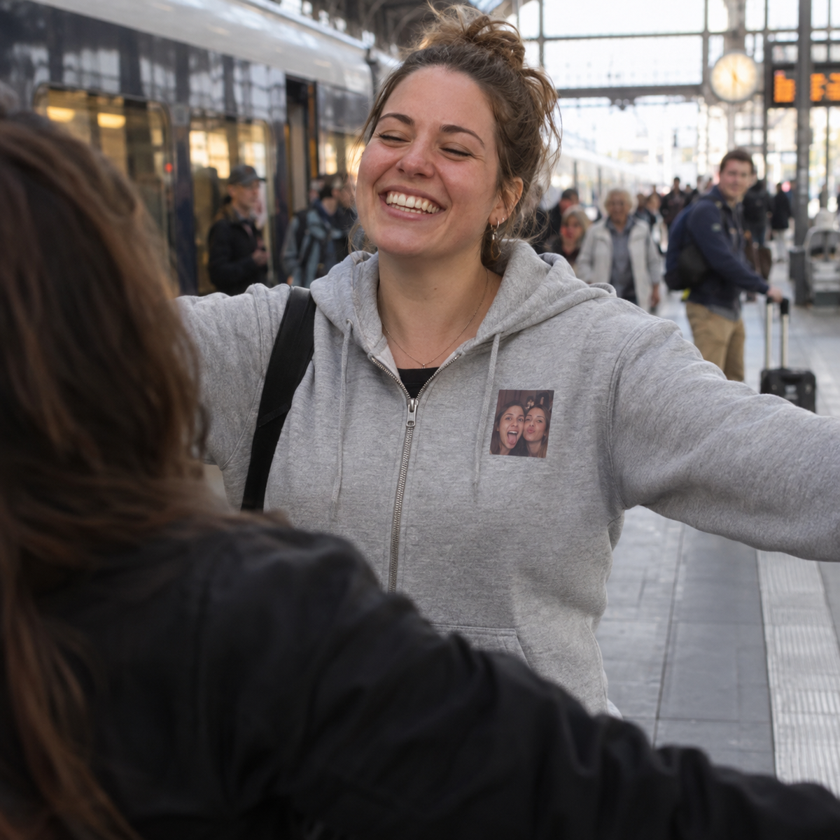 A zip hoodie with a small photo printed on its left chest during a reunion.