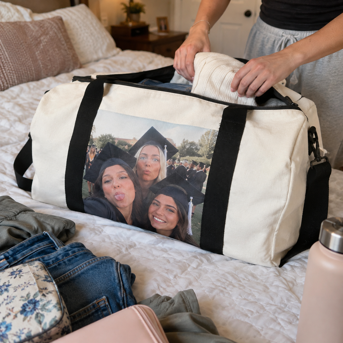 Weekender travel bag printed with a funny graduation picture.