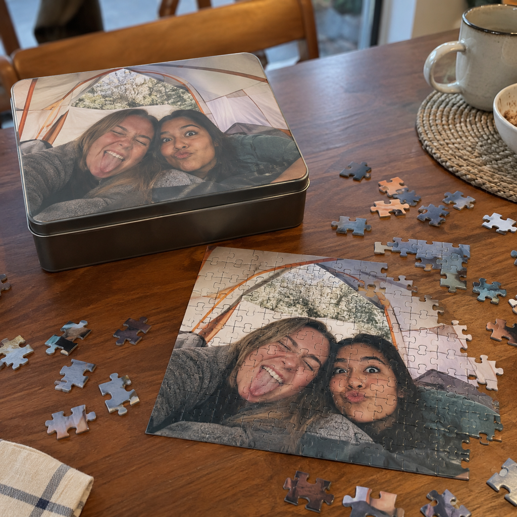 Puzzle and matching tin printed with a camping trip among friends.