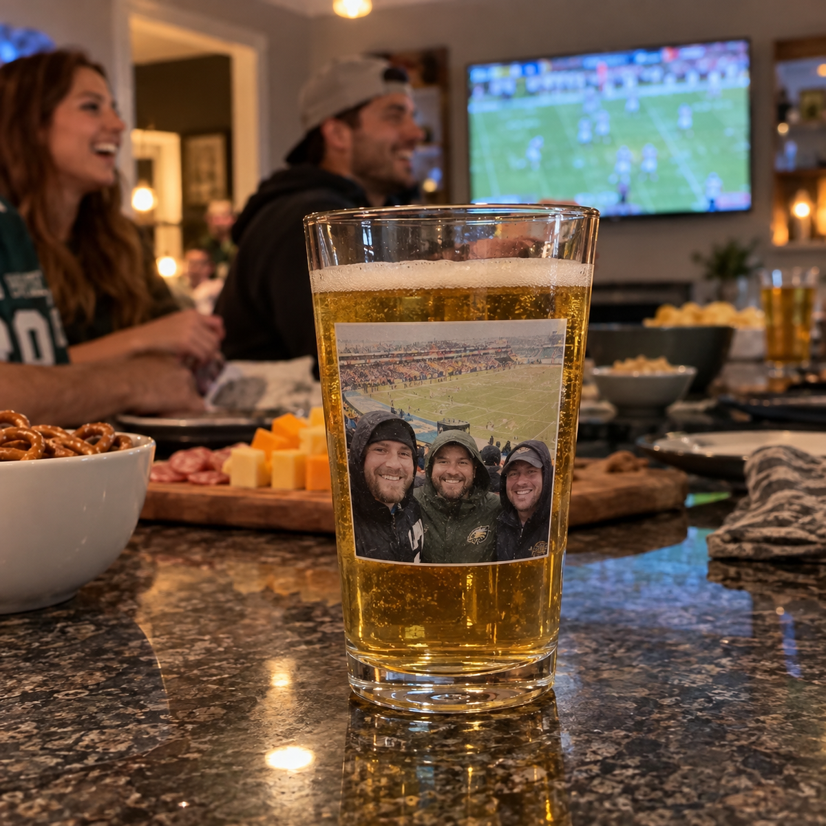 Photo pint glass with friends at a football game.