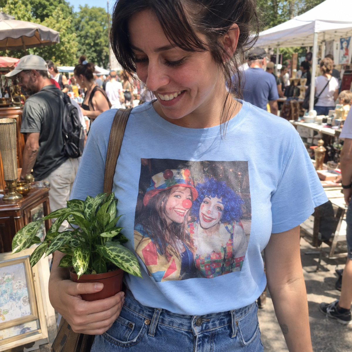Pale blue photo T-shirt carrying a playful costume party snapshot.