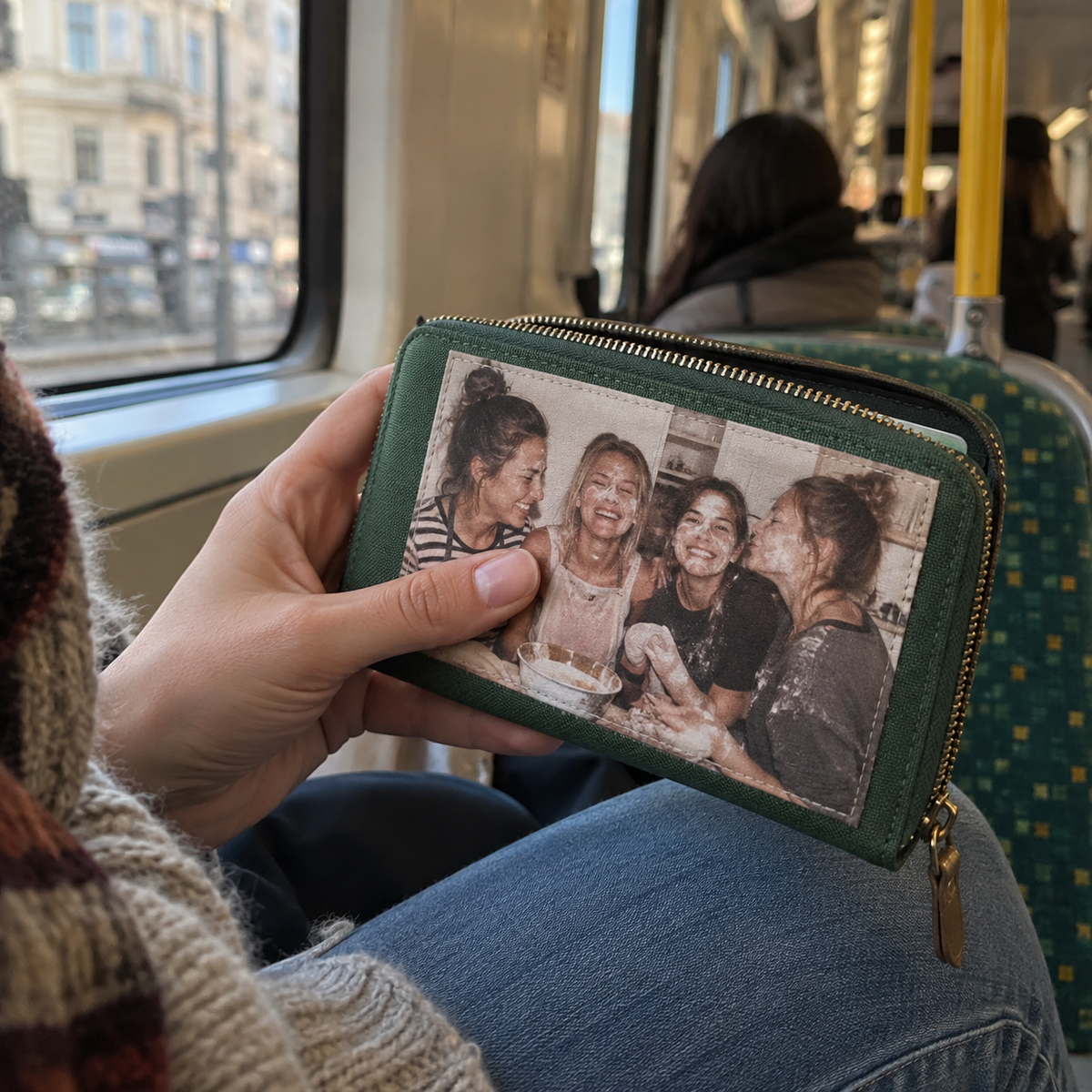 Green zip wallet printed with a candid friends’ baking photograph.