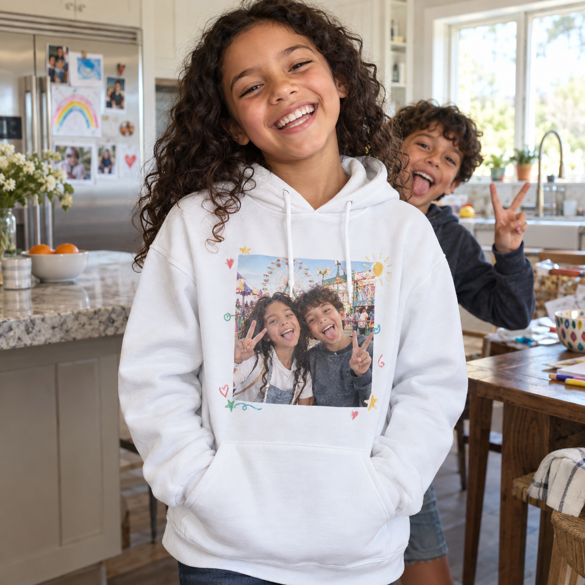 White personalized kids hoodie printed with a candid fairground photo of two siblings laughing.