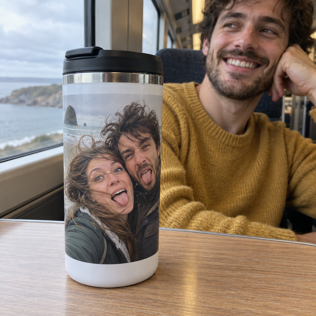 Personalized white travel mug printed with a playful windswept couple photo on a train journey.